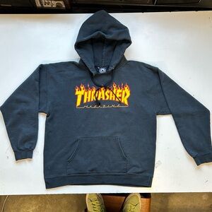 Thrasher Black hooded sweatshirt, worn in nicely, ripped a little at the collar